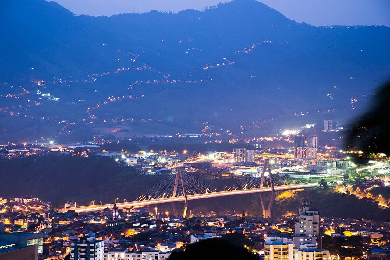 The César Gaviria Trujillo viaduct lit up at night